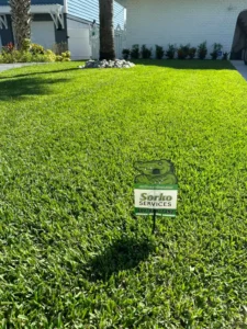 Freshly trimmed residential lawn after receiving lawn care service by Sorko Lawn and Pest Control in Central Florida